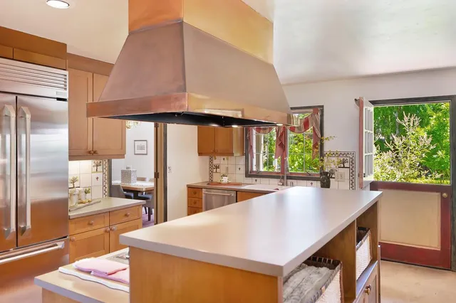 a living room with furniture fireplace and flat screen tv