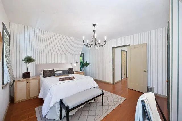 a view of a house with a tree