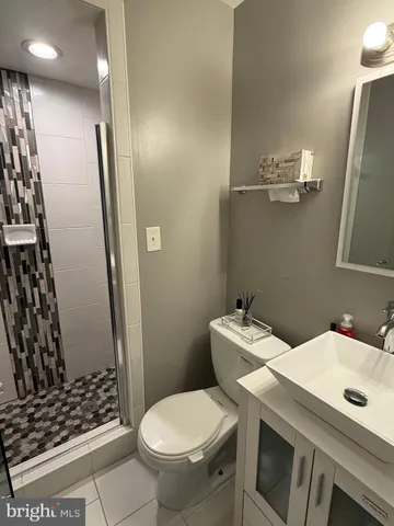 a view of house with backyard and deck