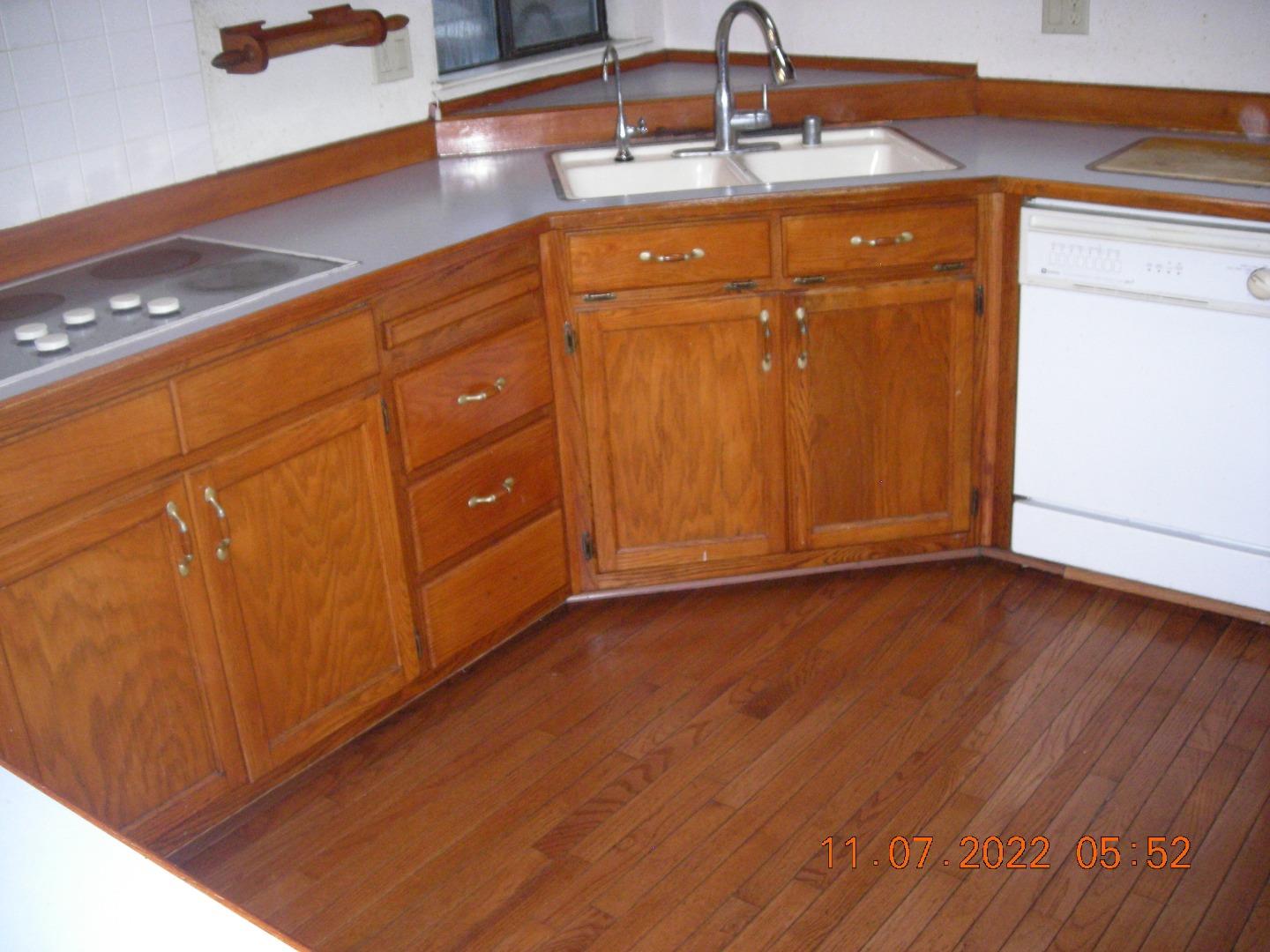 77 Crespi, Unit 77 Watsonville, CA 95076 - Photo 13 of 19 a view of a livingroom with wooden floor and cabinet