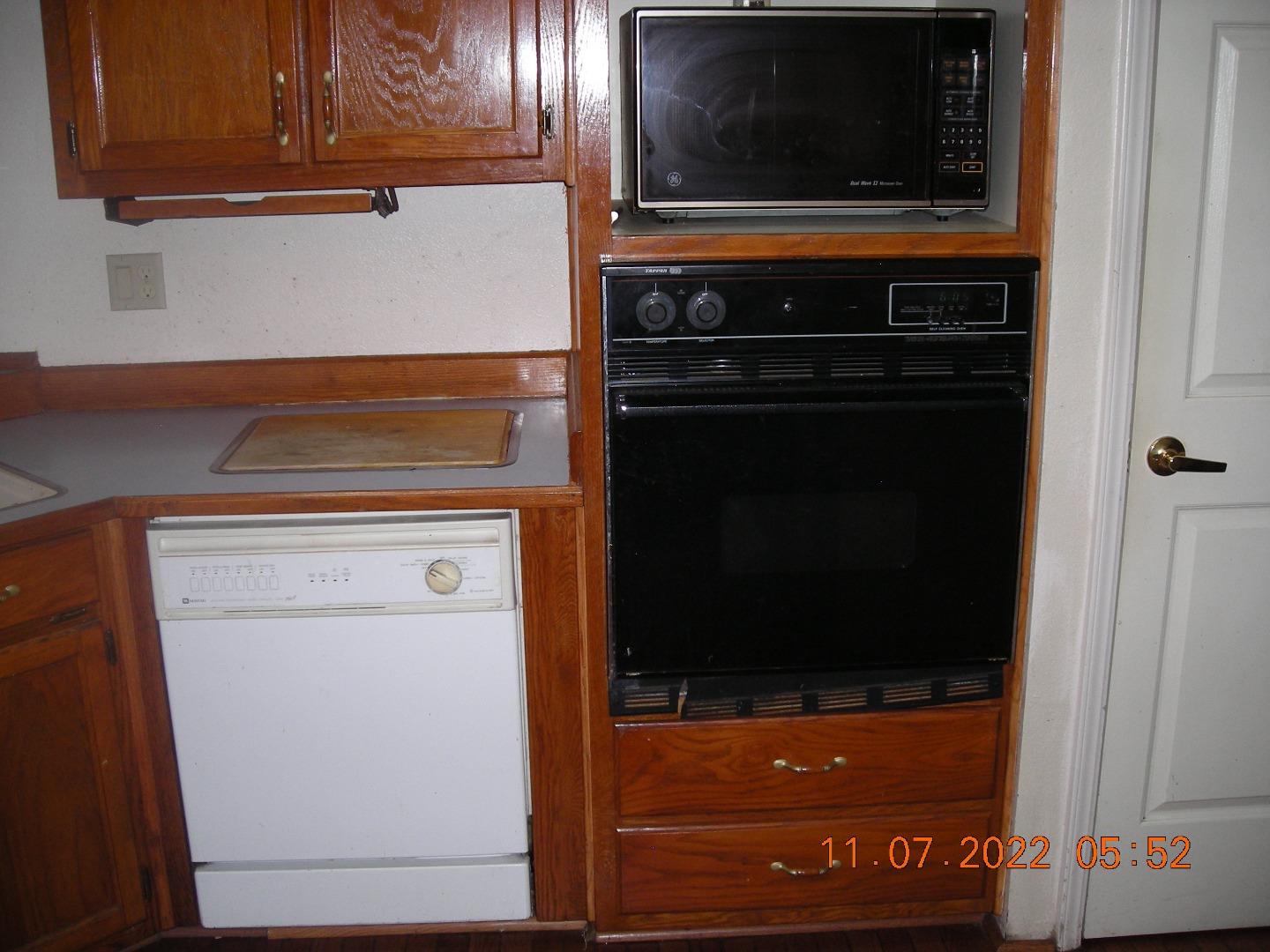77 Crespi, Unit 77 Watsonville, CA 95076 - Photo 14 of 19 a view of a kitchen with washer and dryer