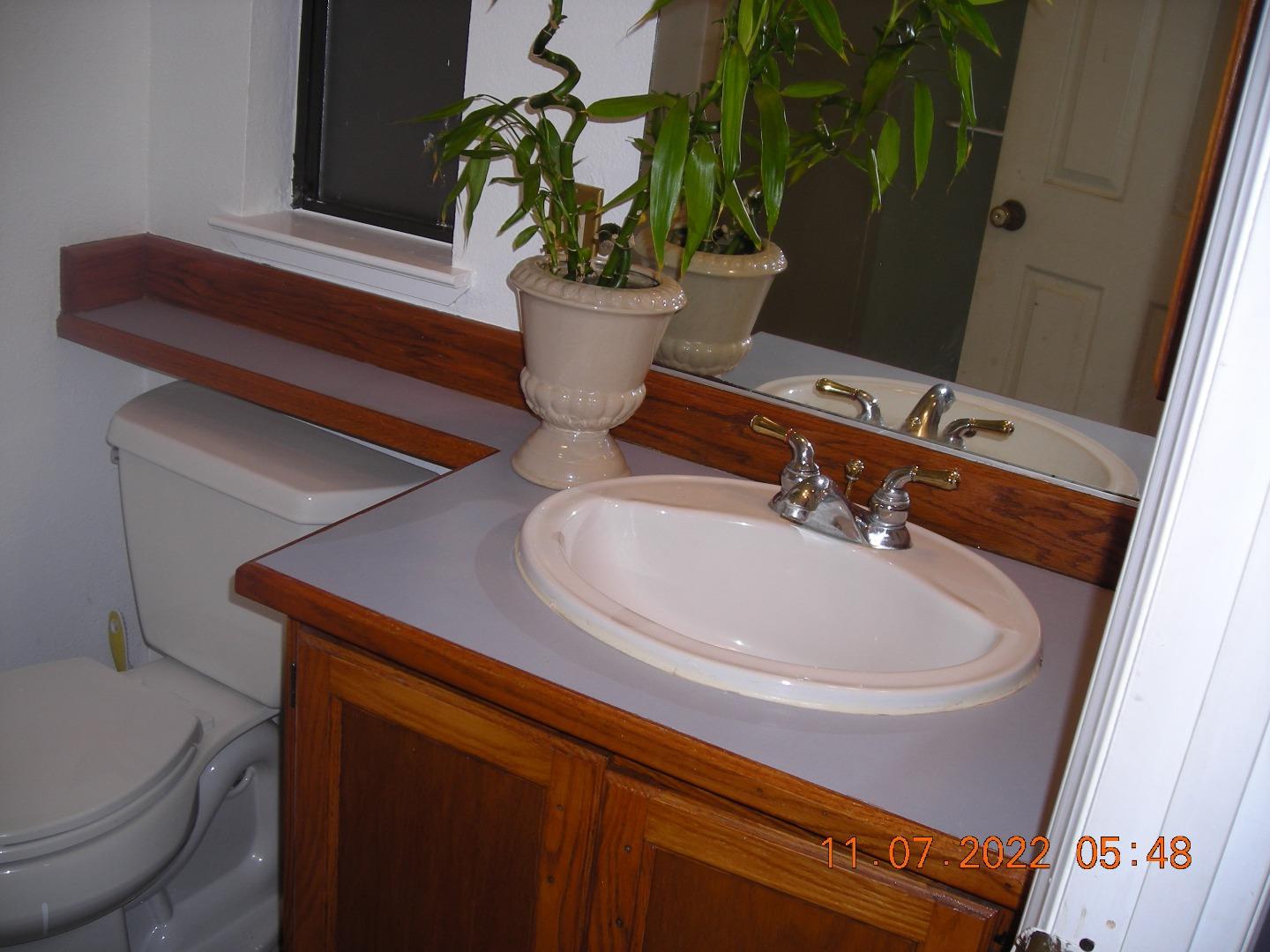 77 Crespi, Unit 77 Watsonville, CA 95076 - Photo 7 of 19 a bathroom with a sink a toilet and tub