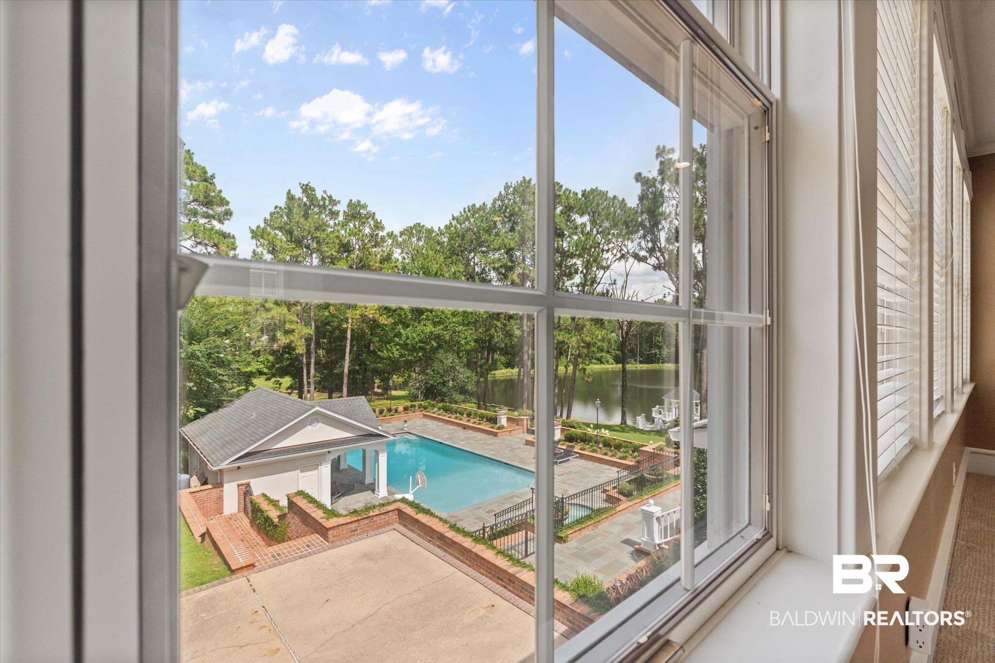 8561 Dawes Lake Road Mobile, AL 36619 - Photo 36 of 63 View of pool featuring a water view and view of scattered trees