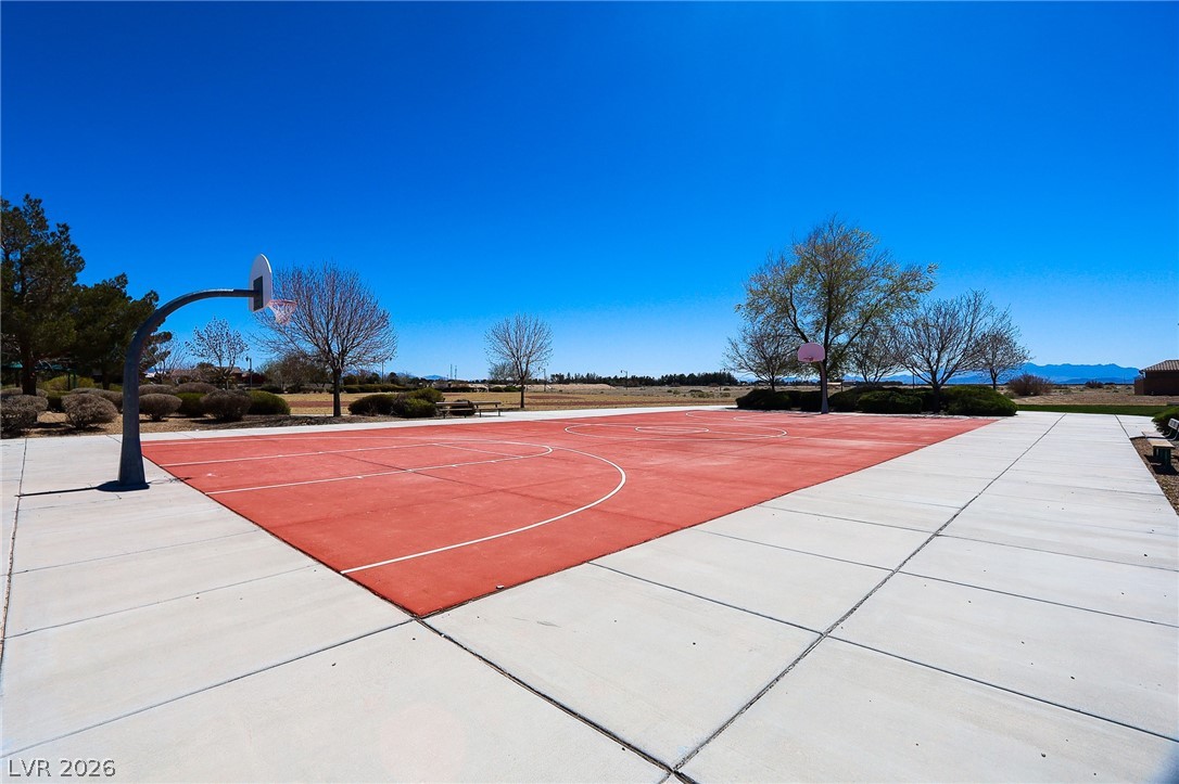 6472 Centennial Road Pahrump, NV 89048 - Photo 25 of 29 An outdoor basketball court provides recreational opportunities under the open sky.