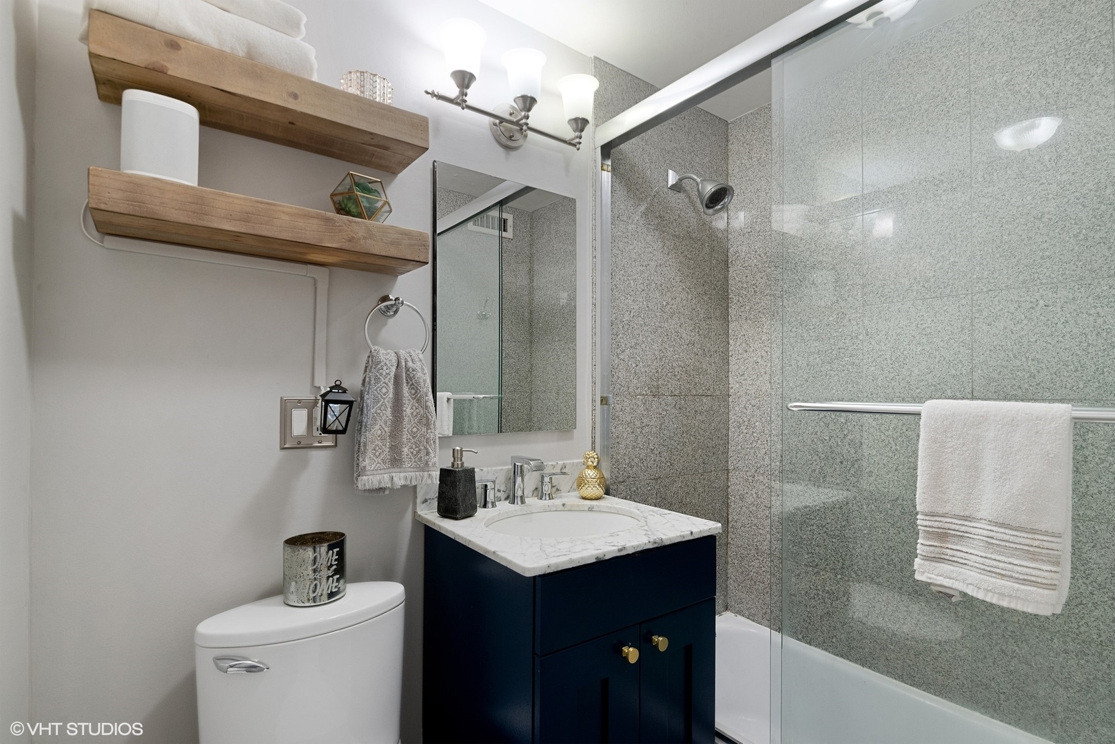 2930 North Sheridan Road, Unit 1611 Chicago, IL 60657 - Photo 13 of 18 a bathroom with a sink a toilet and shower