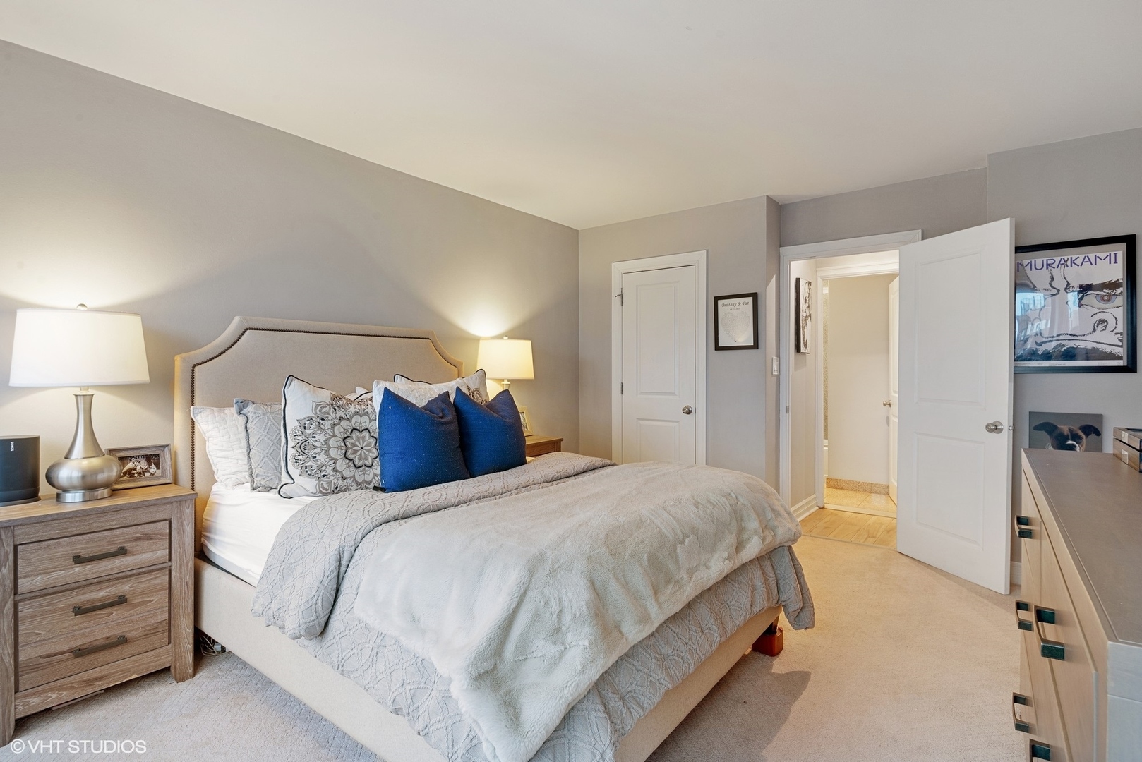 2930 North Sheridan Road, Unit 1611 Chicago, IL 60657 - Photo 10 of 18 a bedroom with a bed and a lamp