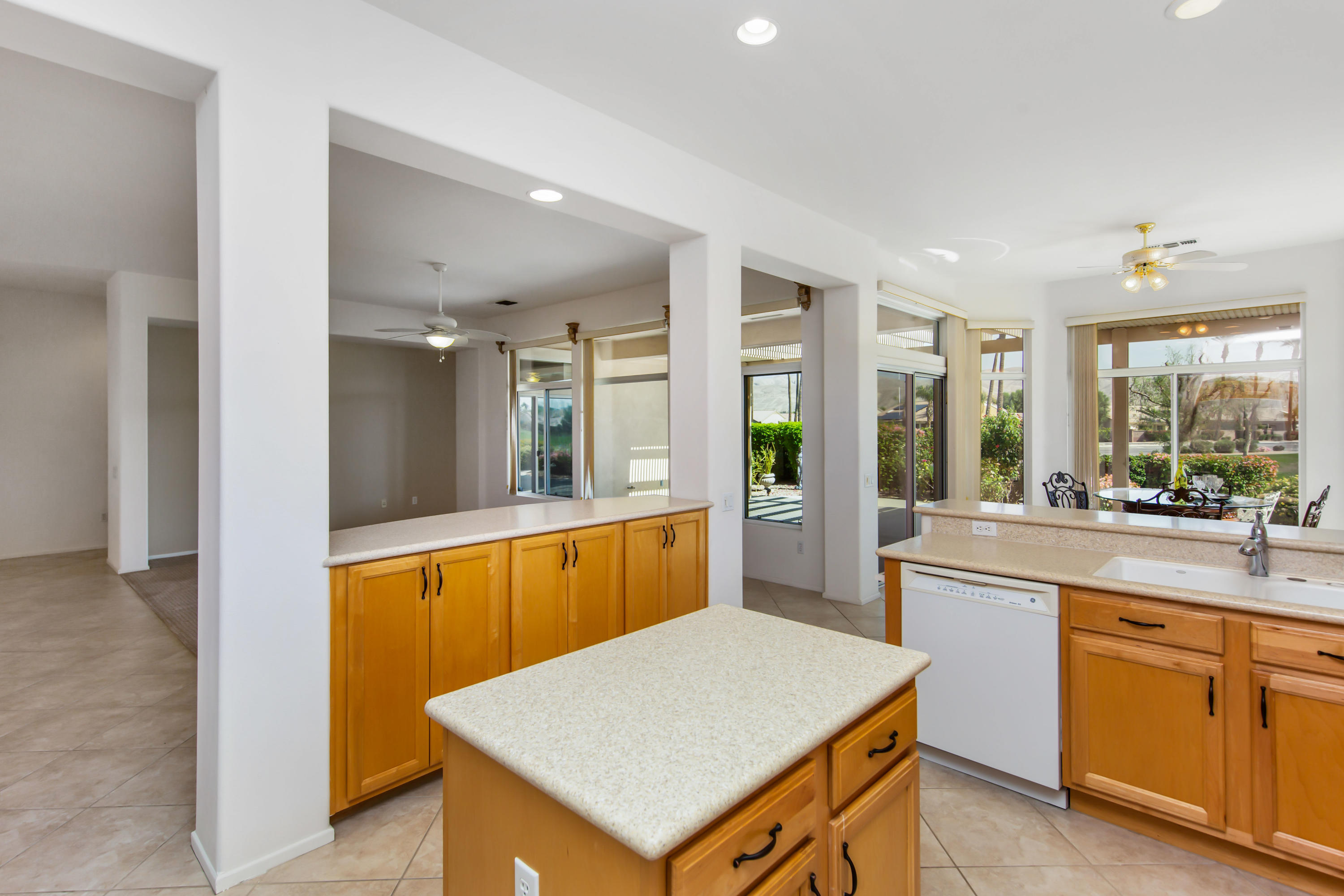35076 Moorbrook Road Palm Desert, CA 92211 - Photo 18 of 45 a kitchen with a sink a counter top space and appliances