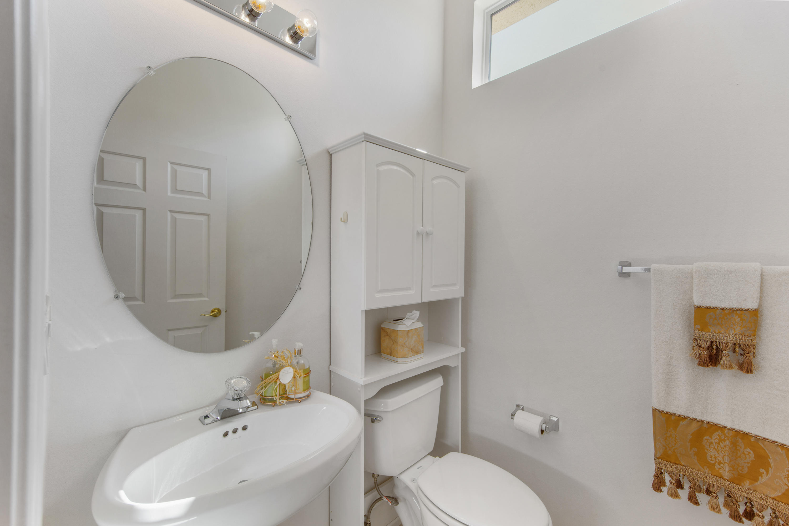 35076 Moorbrook Road Palm Desert, CA 92211 - Photo 22 of 45 a bathroom with a sink mirror and toilet