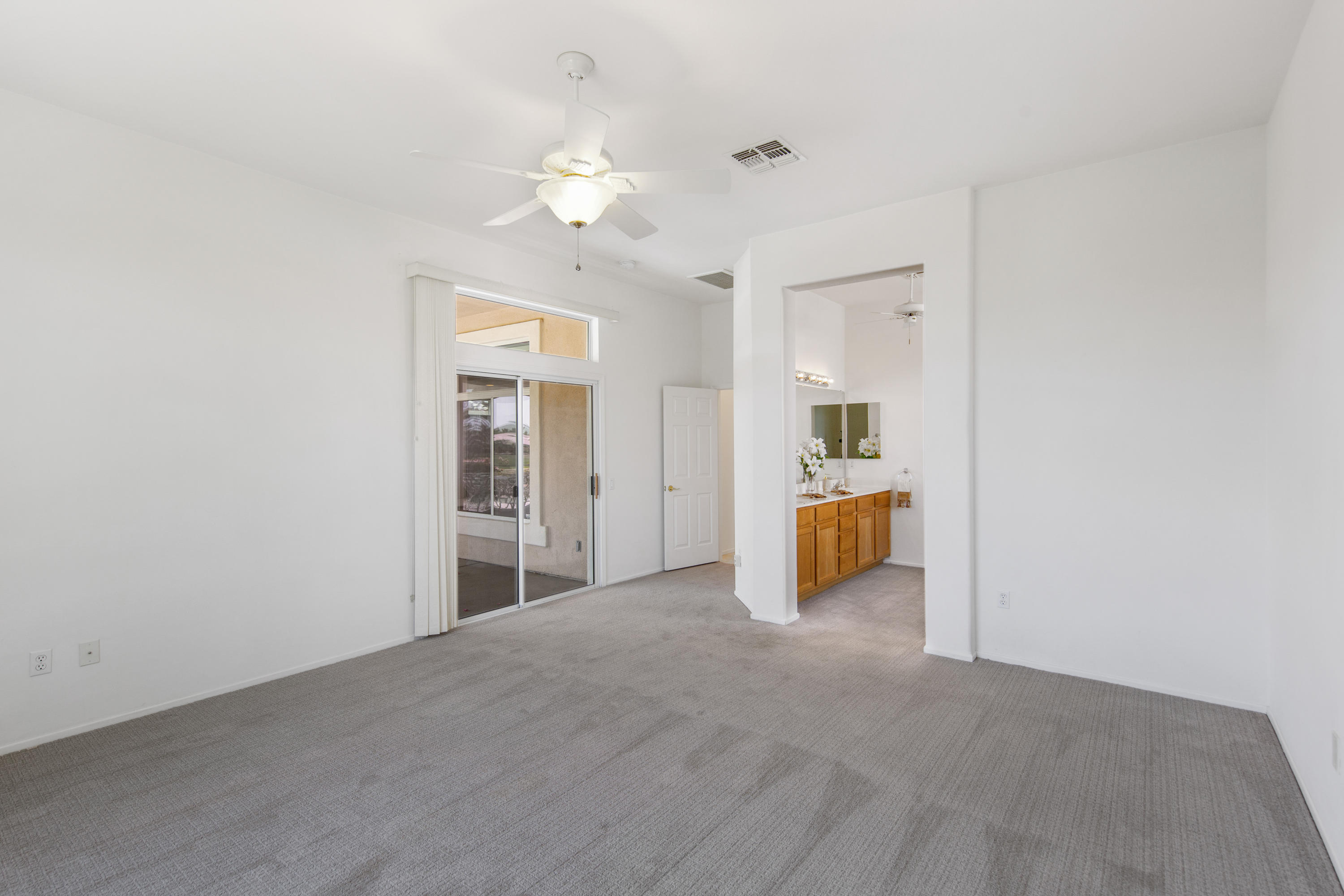 35076 Moorbrook Road Palm Desert, CA 92211 - Photo 25 of 45 an empty room with a bathroom and a sink