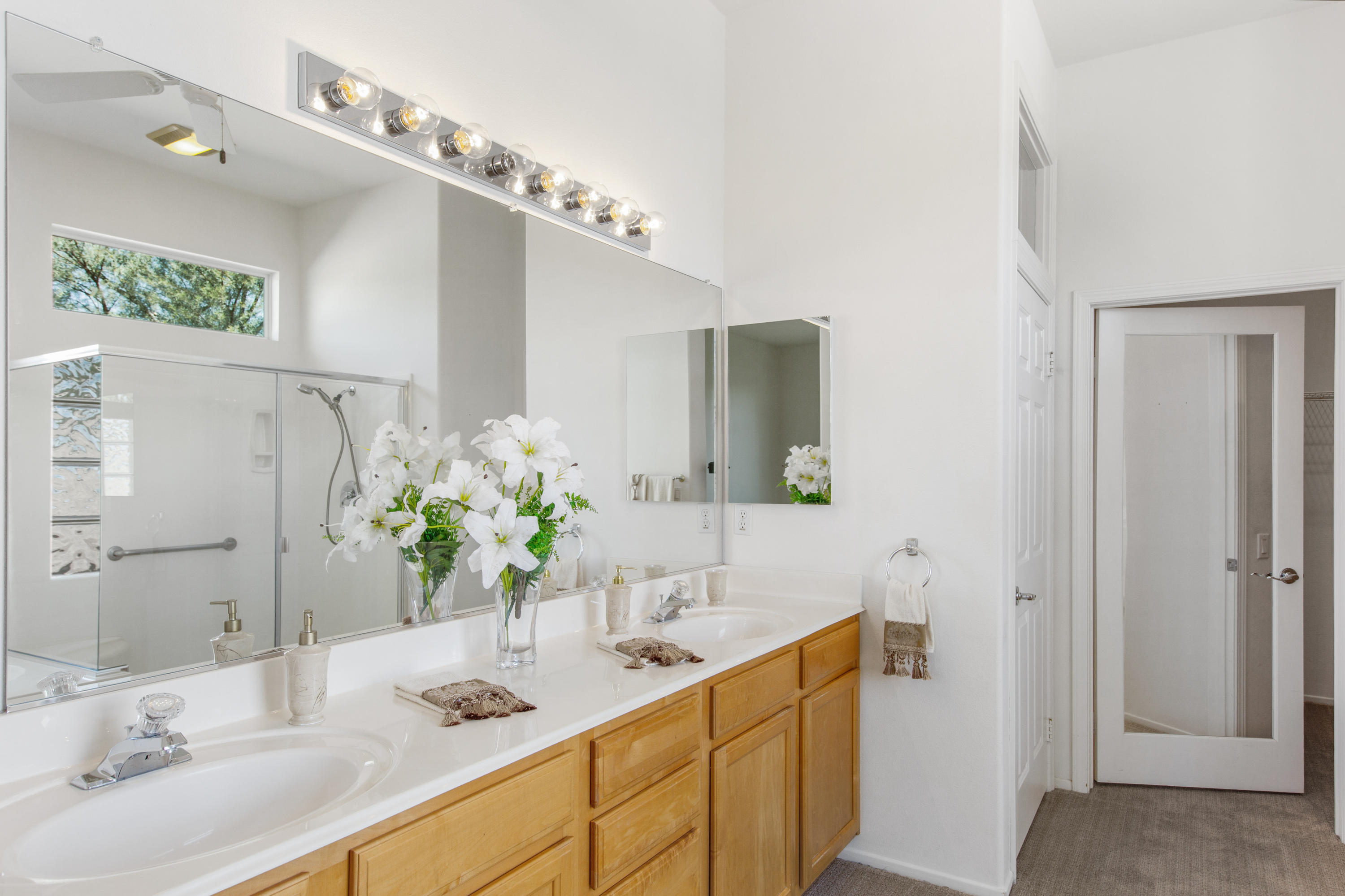 35076 Moorbrook Road Palm Desert, CA 92211 - Photo 26 of 45 a bathroom with a granite countertop double vanity sink and a mirror