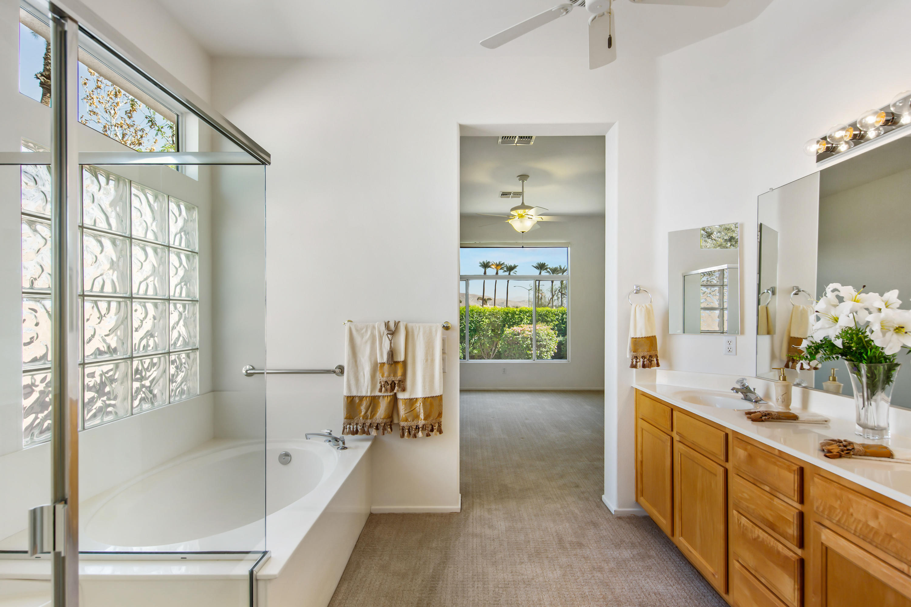 35076 Moorbrook Road Palm Desert, CA 92211 - Photo 28 of 45 a spacious bathroom with sink shower and bathtub