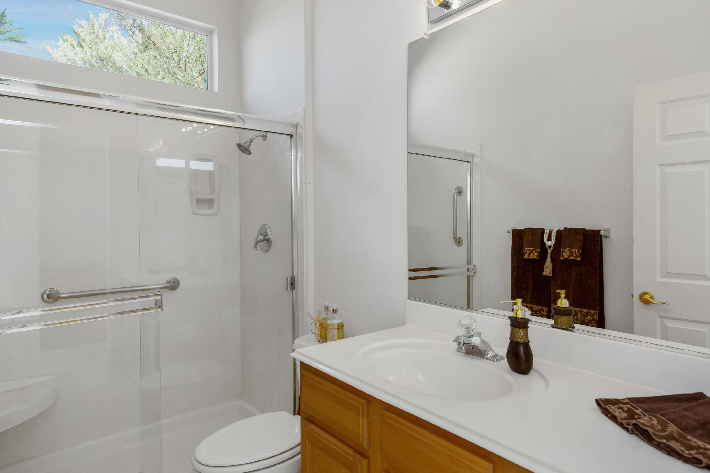 35076 Moorbrook Road Palm Desert, CA 92211 - Photo 33 of 45 a bathroom with a sink toilet and shower