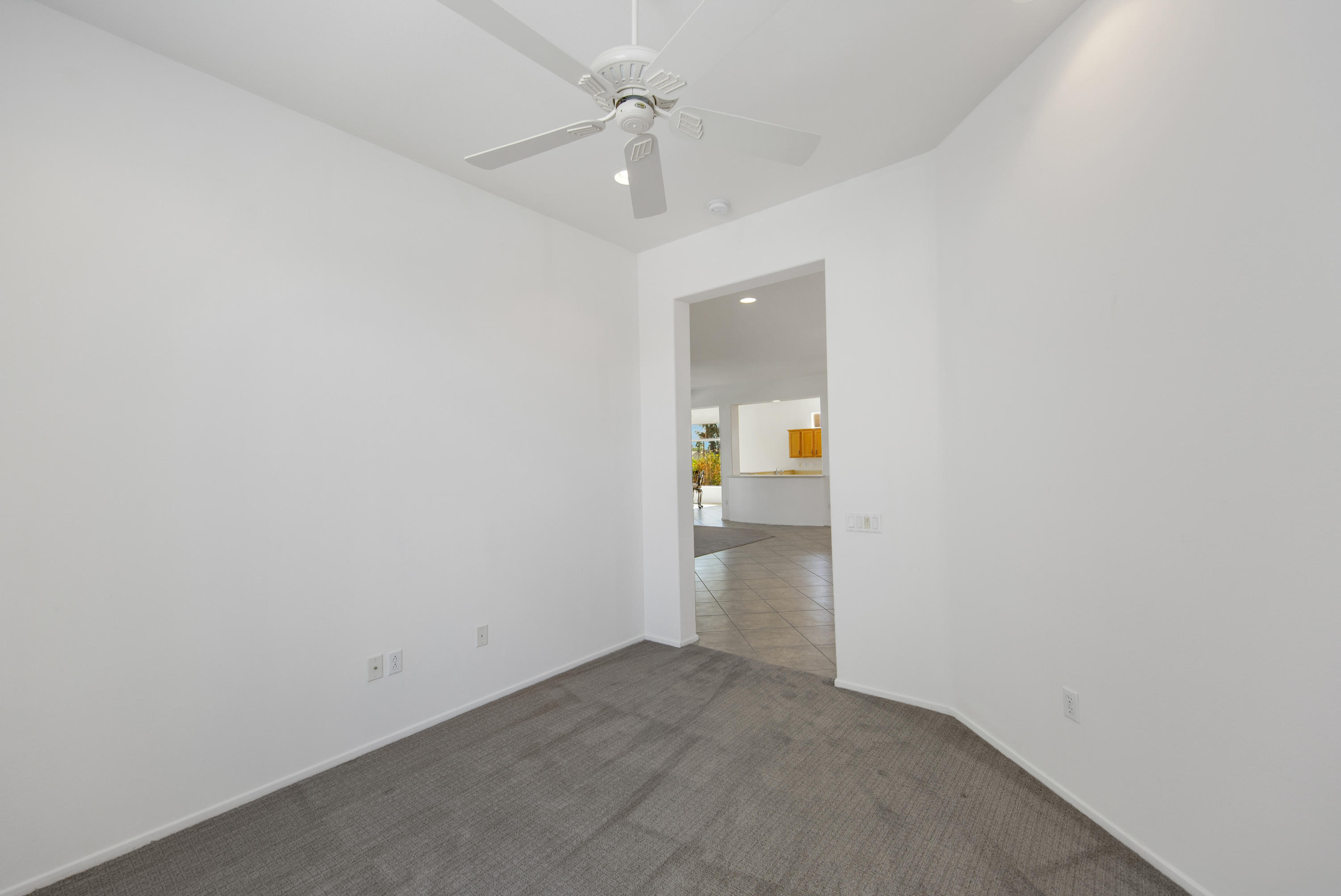 35076 Moorbrook Road Palm Desert, CA 92211 - Photo 35 of 45 a view of a storage & utility room with a window