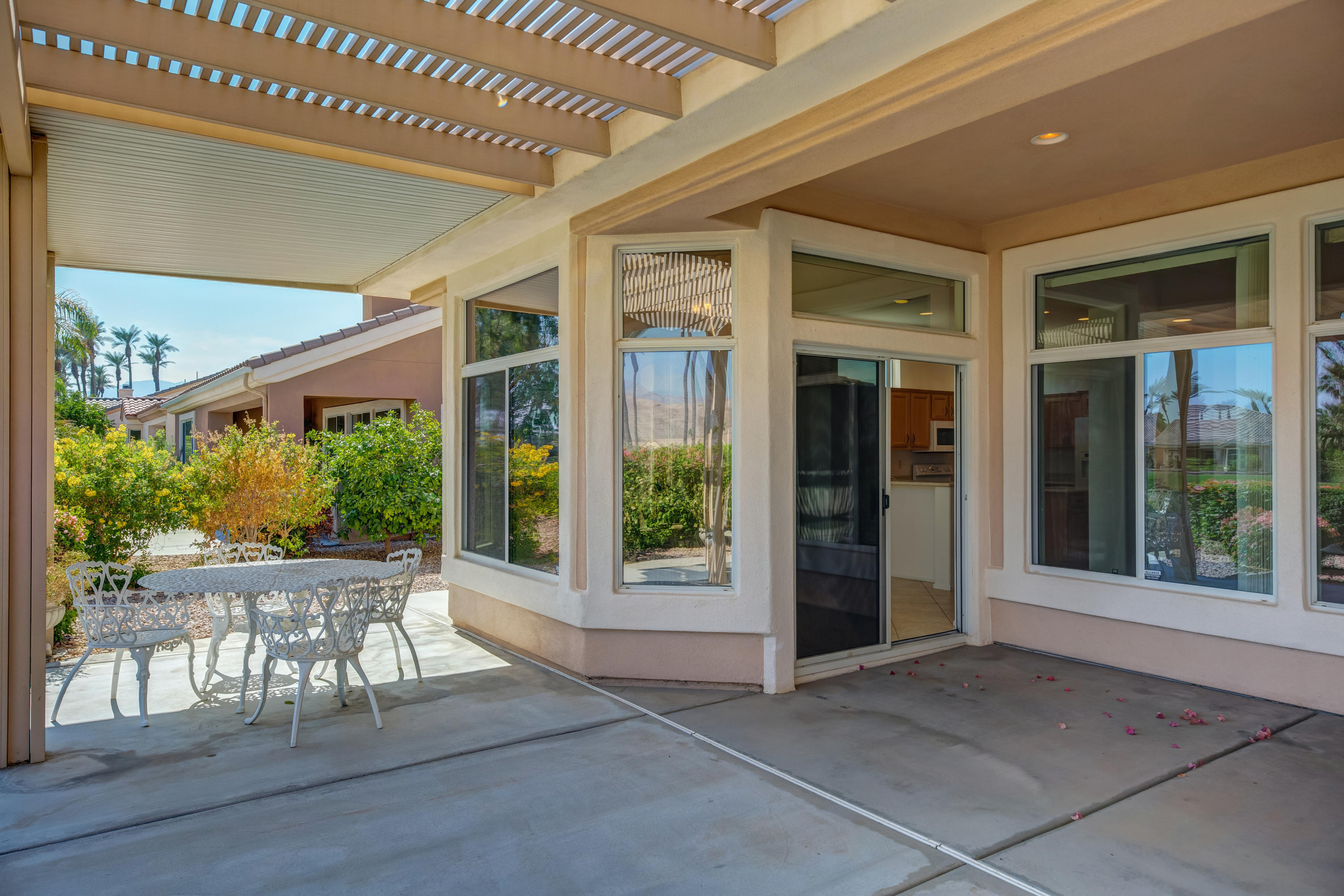 35076 Moorbrook Road Palm Desert, CA 92211 - Photo 38 of 45 a view of a hall with an outdoor space