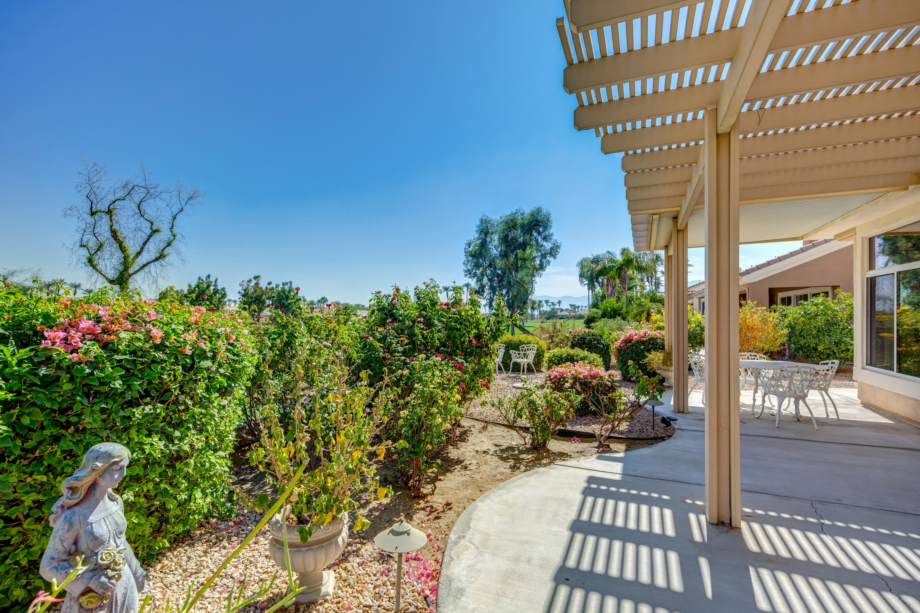 35076 Moorbrook Road Palm Desert, CA 92211 - Photo 40 of 45 a view of a porch with furniture