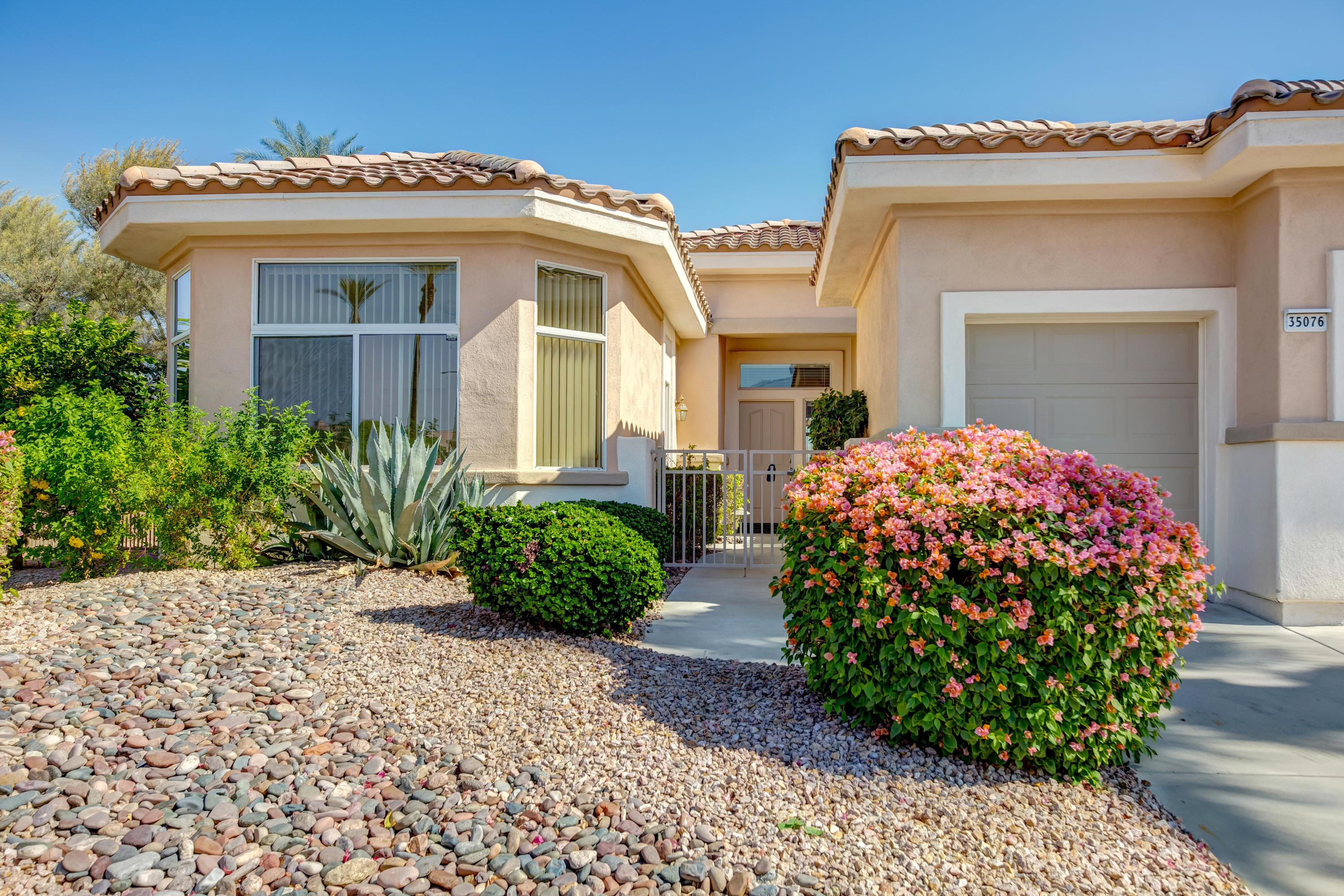 35076 Moorbrook Road Palm Desert, CA 92211 - Photo 6 of 45 a front view of a house