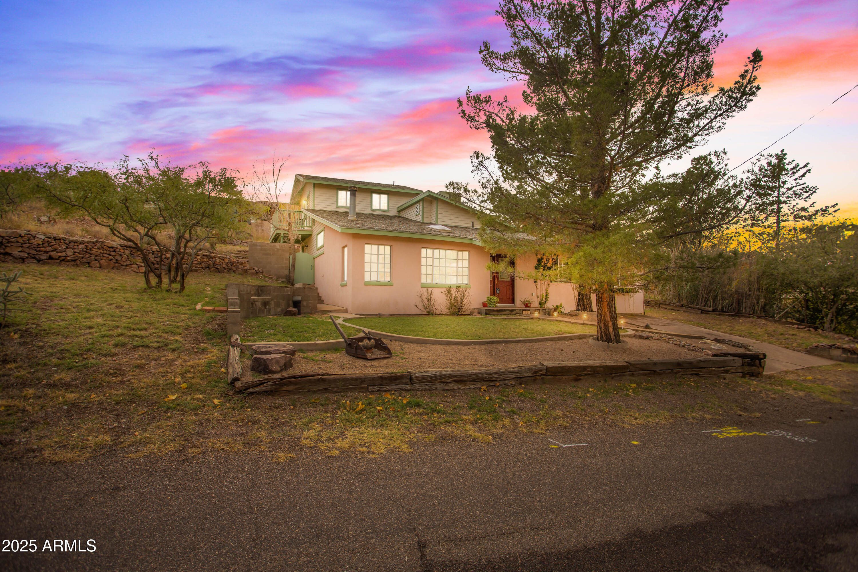 706 Shattuck Street Bisbee, AZ 85603 - Photo 1 of 55 a view of a house with a yard