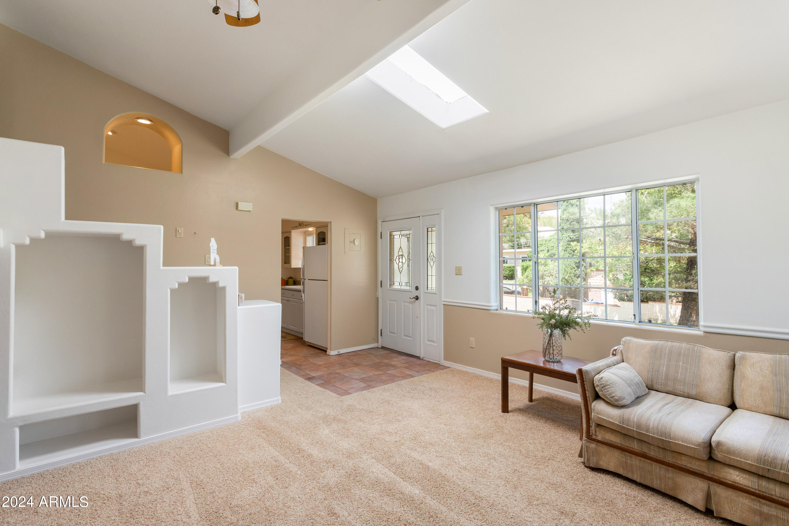 706 Shattuck Street Bisbee, AZ 85603 - Photo 10 of 55 a living room with furniture and a large window