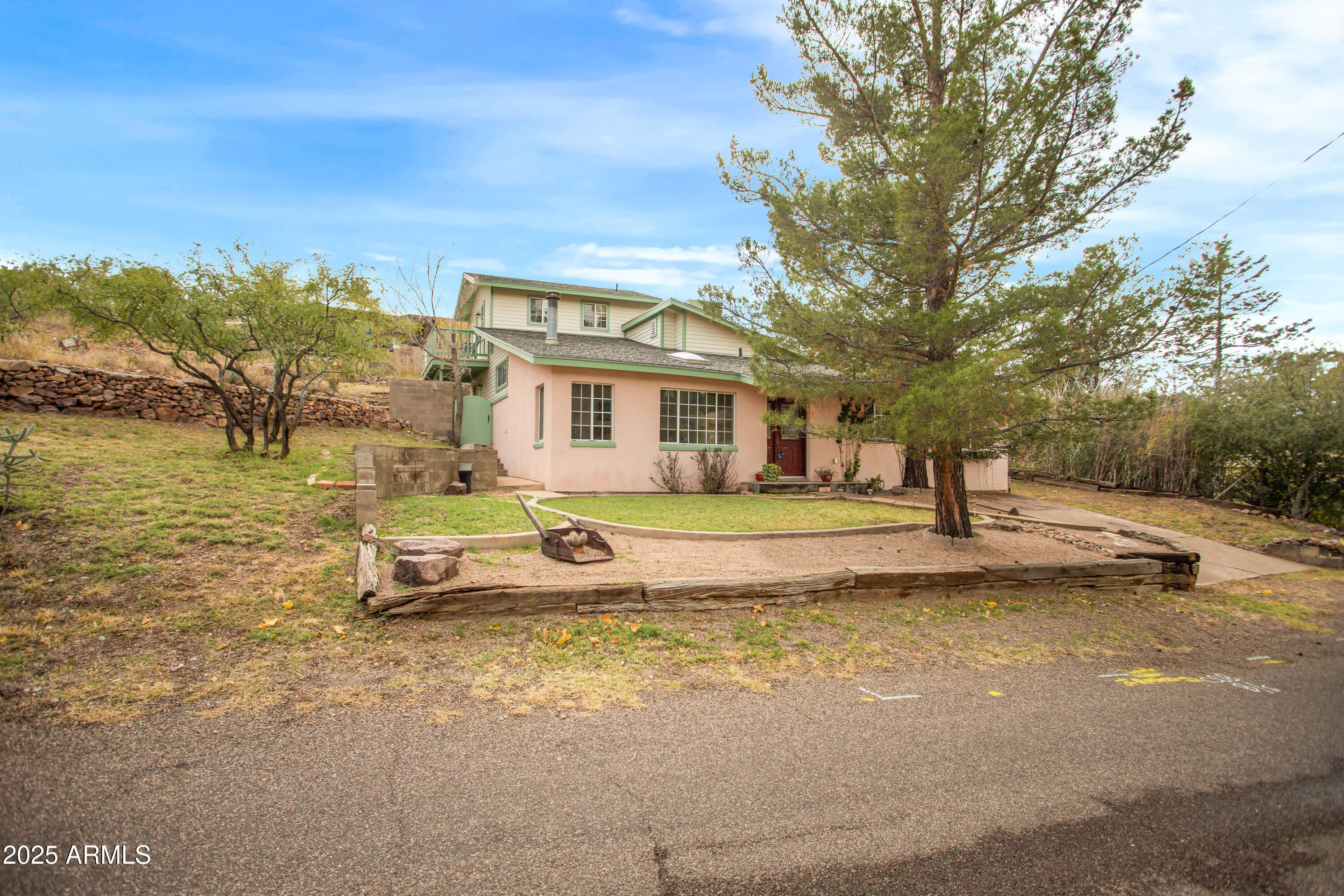 706 Shattuck Street Bisbee, AZ 85603 - Photo 2 of 55 a view of a house with pool and a yard
