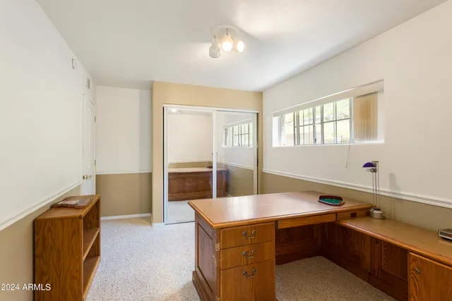 a room with a sink and a window