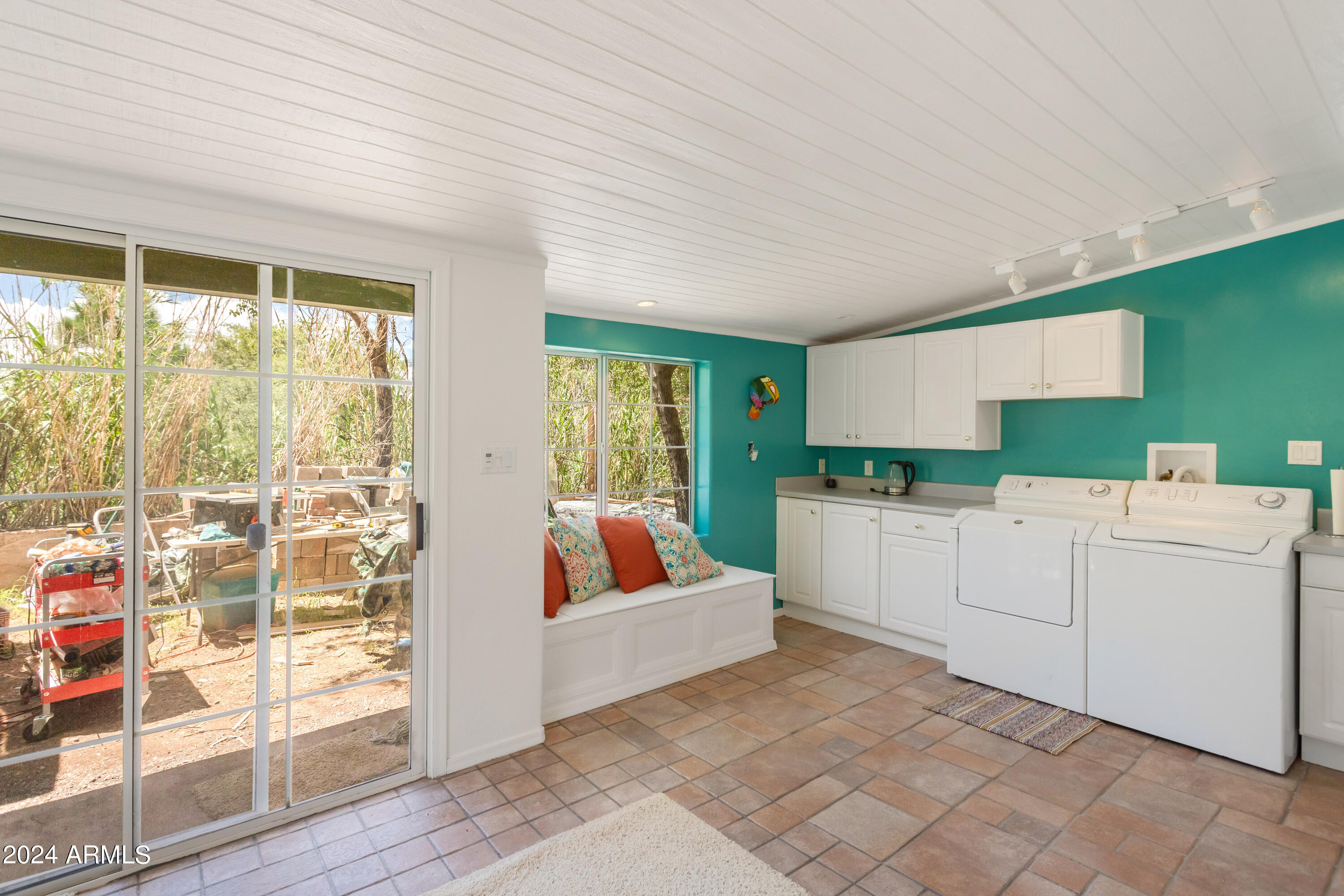 706 Shattuck Street Bisbee, AZ 85603 - Photo 37 of 55 a living room with furniture and a large window