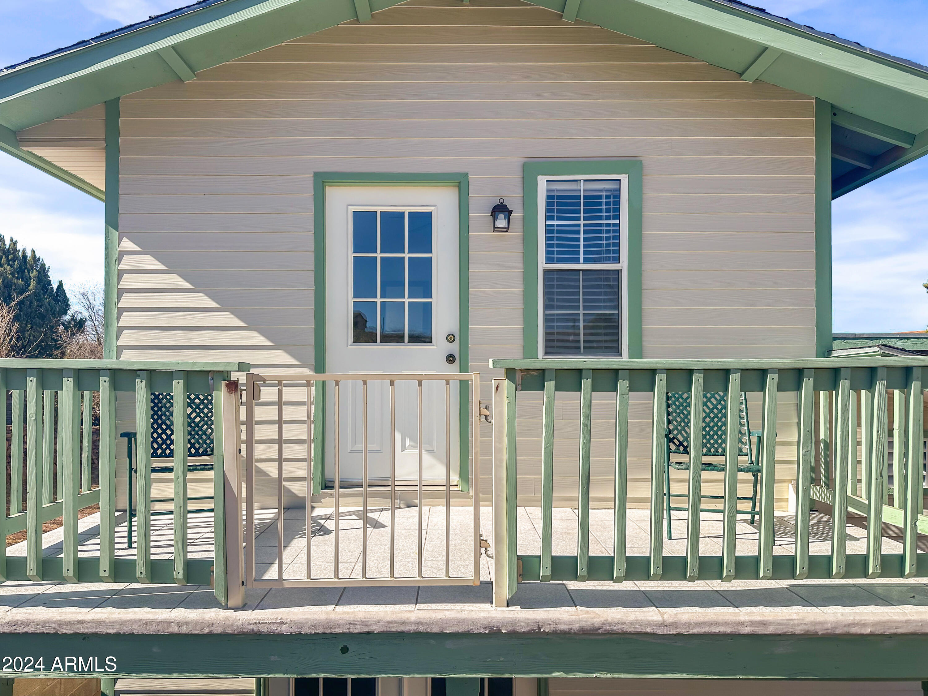 706 Shattuck Street Bisbee, AZ 85603 - Photo 40 of 55 a view of a house with a porch