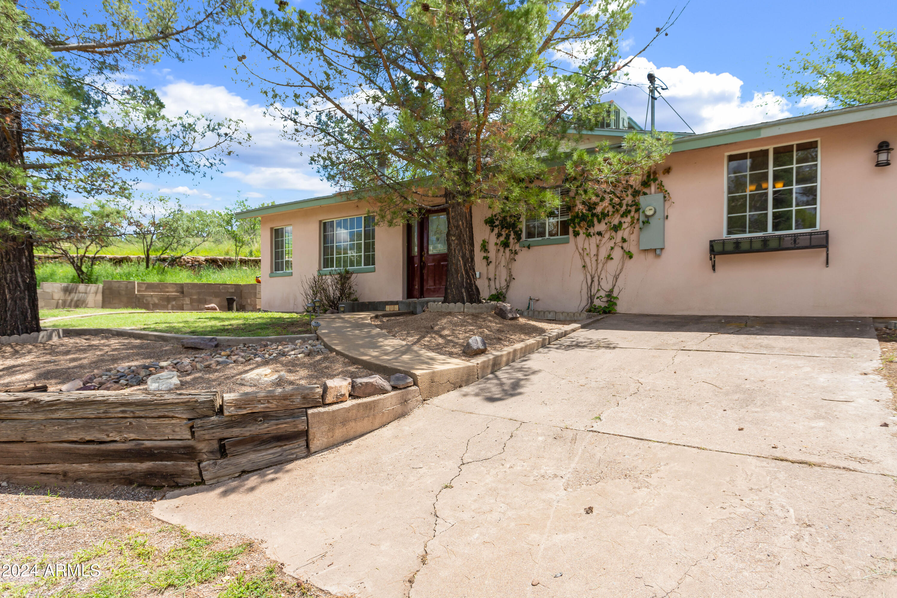 706 Shattuck Street Bisbee, AZ 85603 - Photo 47 of 55 a front view of a house with garden