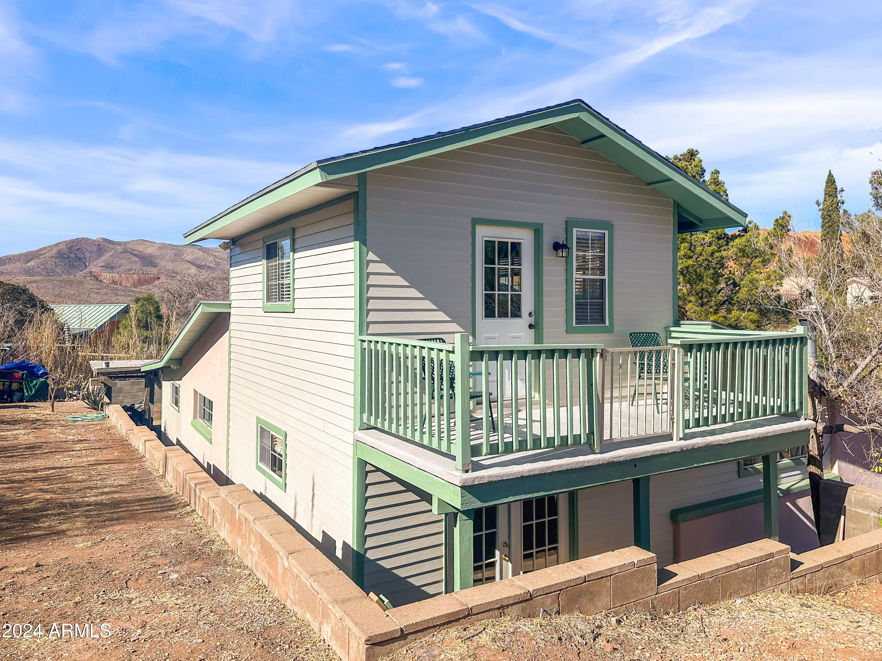 706 Shattuck Street Bisbee, AZ 85603 - Photo 48 of 55 a front view of a house with a porch