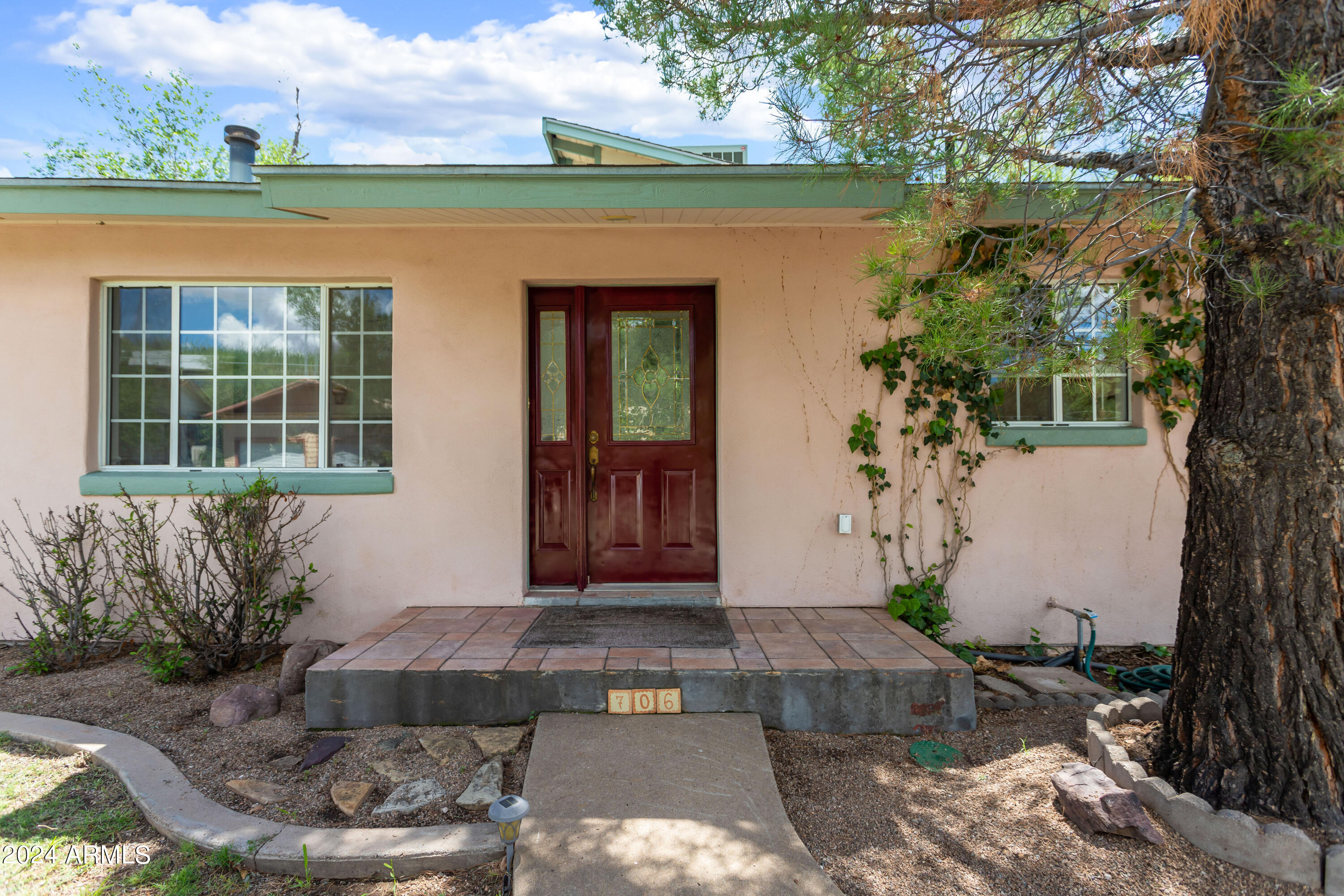 706 Shattuck Street Bisbee, AZ 85603 - Photo 49 of 55 a front view of a house with garden