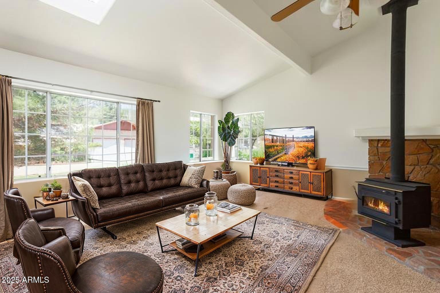 706 Shattuck Street Bisbee, AZ 85603 - Photo 5 of 55 a living room with furniture and a flat screen tv