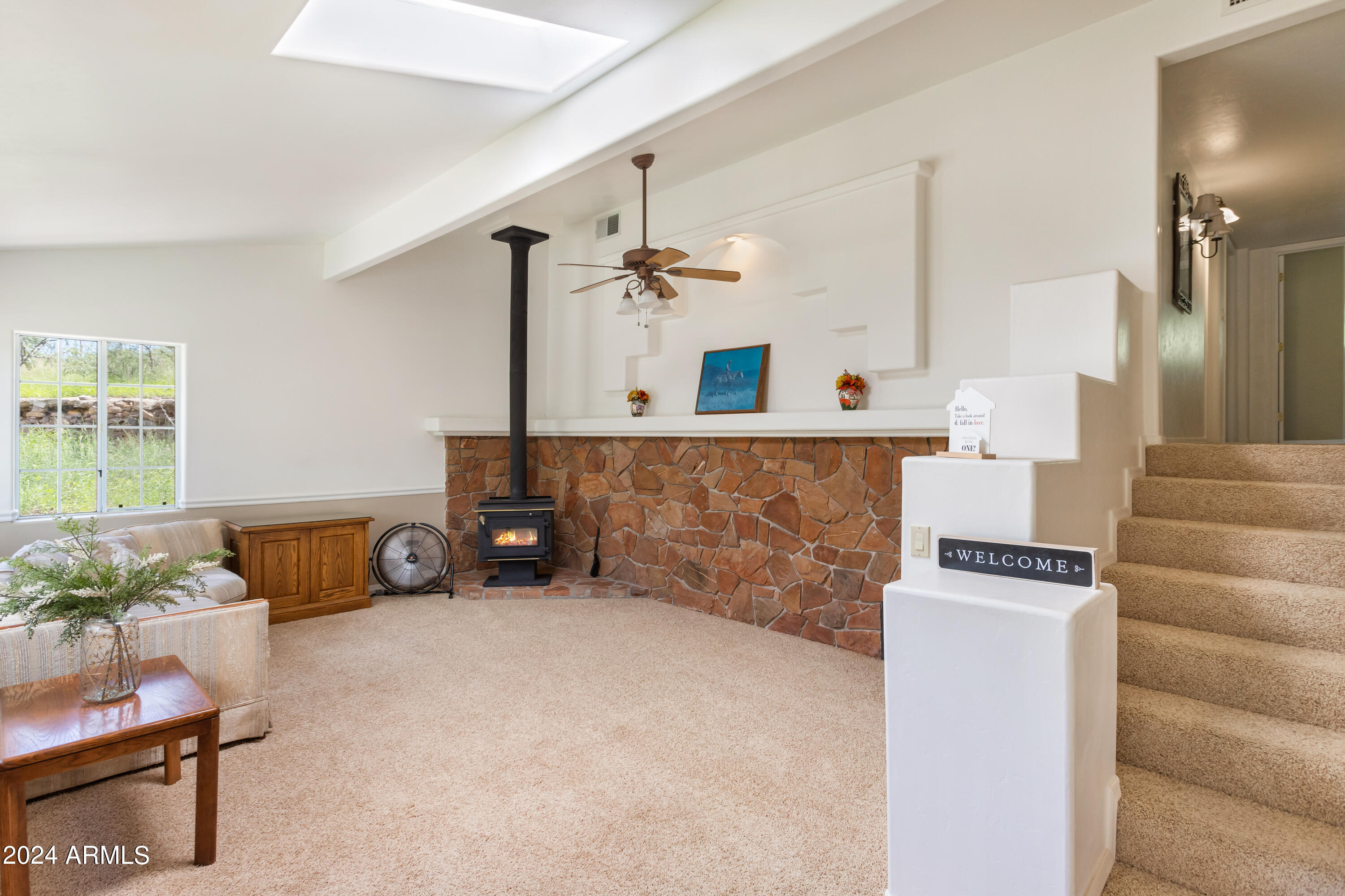 706 Shattuck Street Bisbee, AZ 85603 - Photo 7 of 55 a living room with furniture and a flat screen tv