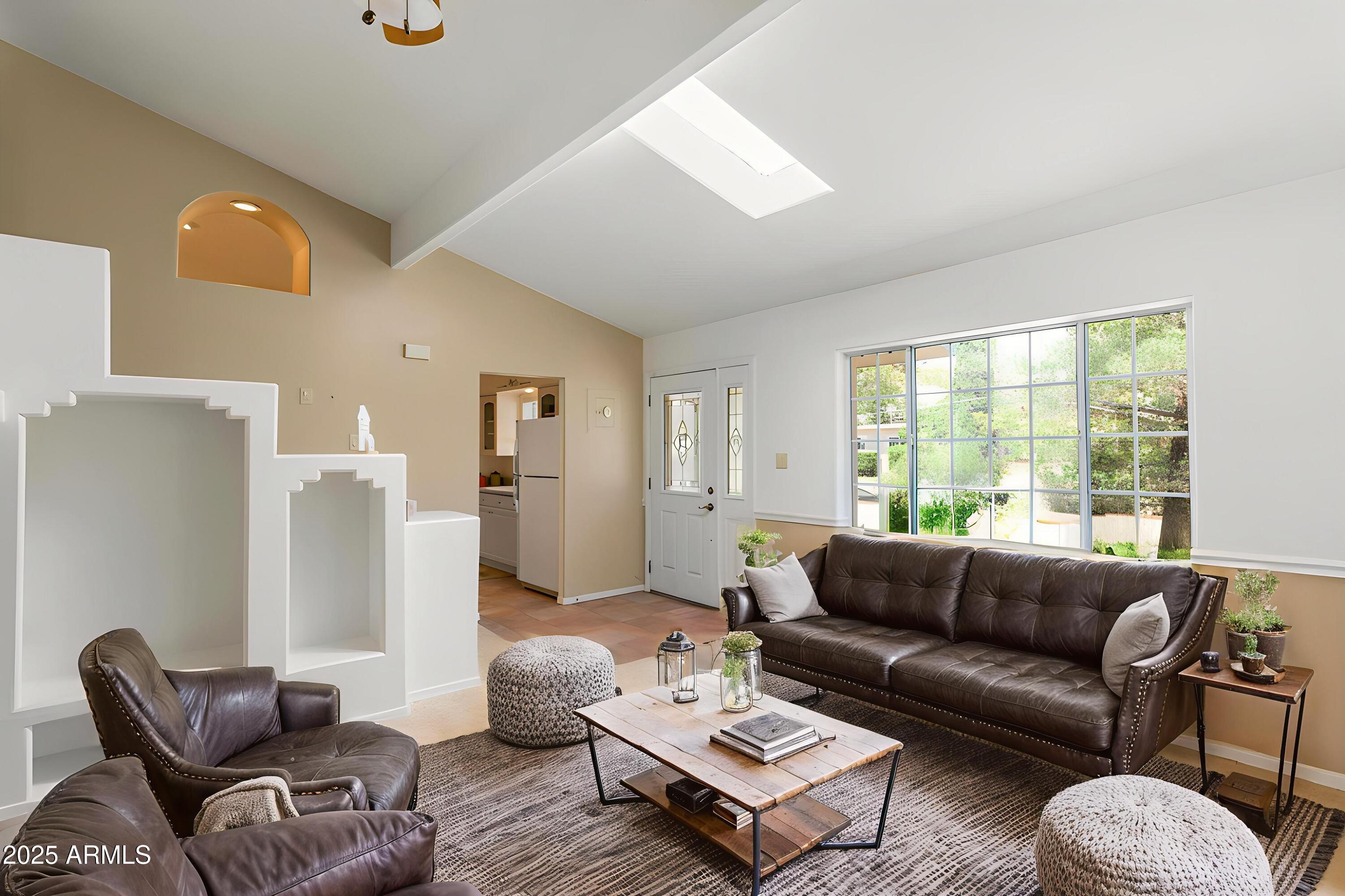 706 Shattuck Street Bisbee, AZ 85603 - Photo 9 of 55 a living room with furniture and a large window
