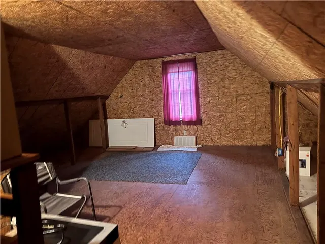 a view of livingroom with furniture and window