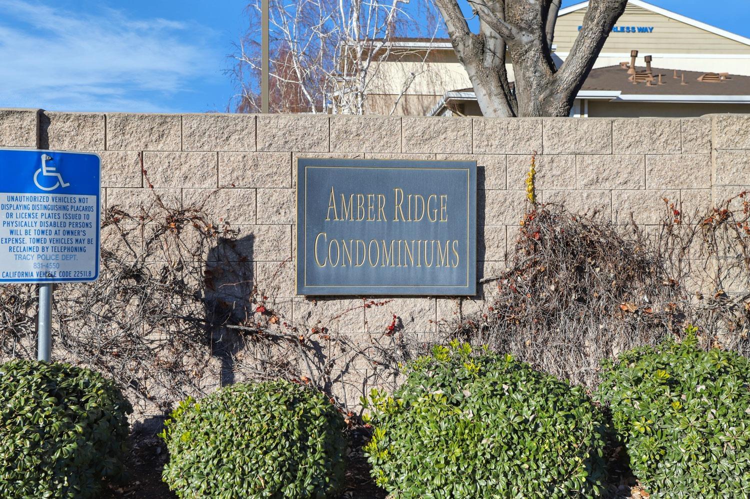 565 Peerless Way, Unit 108 Tracy, CA 95376 - Photo 2 of 15 a sign on the side of a building
