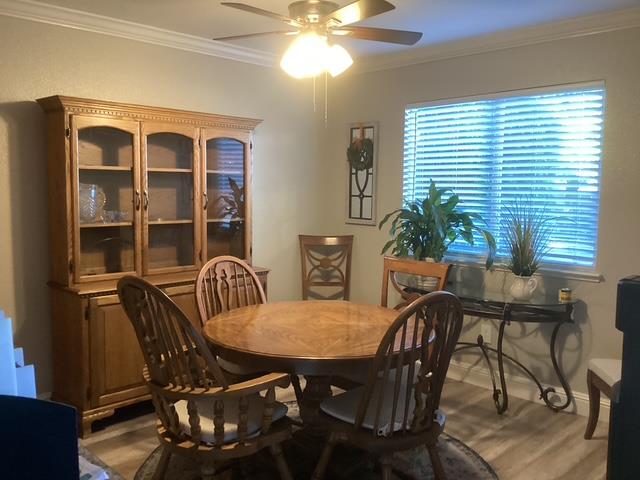 565 Peerless Way, Unit 108 Tracy, CA 95376 - Photo 10 of 15 a view of a dining room with furniture and window