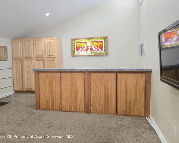 a view of a hallway with workspace