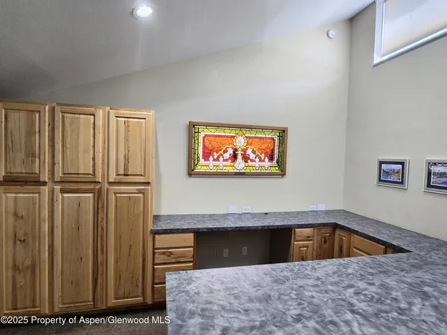 a view of a livingroom with furniture