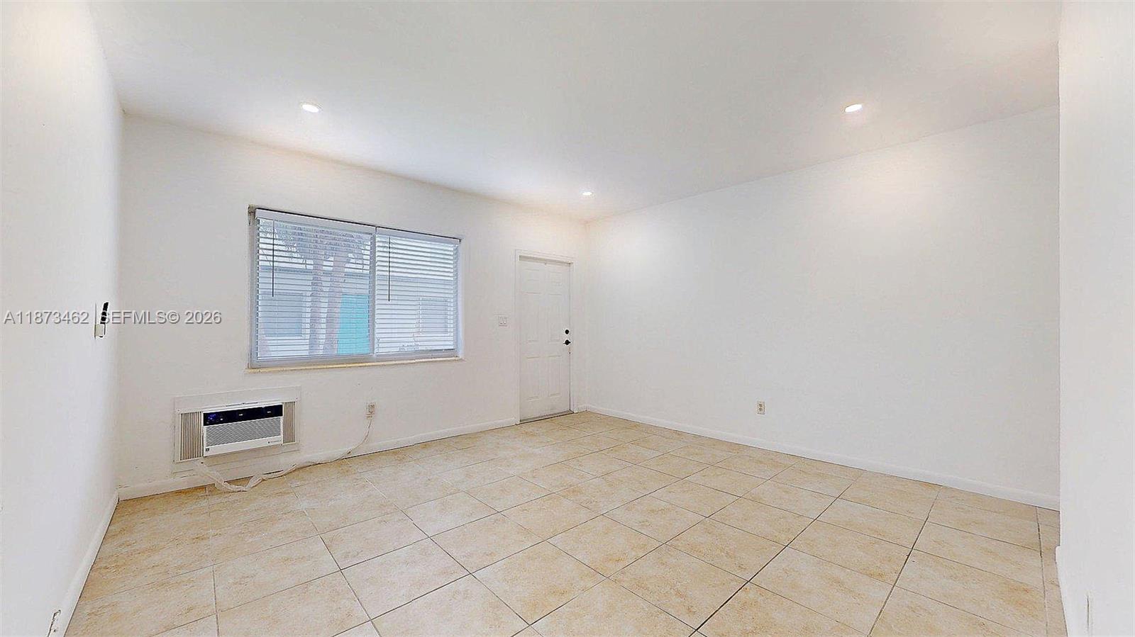 2499 Southwest 27th Street, Unit 7 Miami, FL 33133 - Photo 16 of 16 an empty room with windows