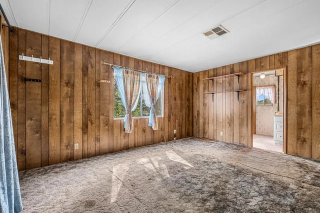 a bathroom with a bathtub and a sink