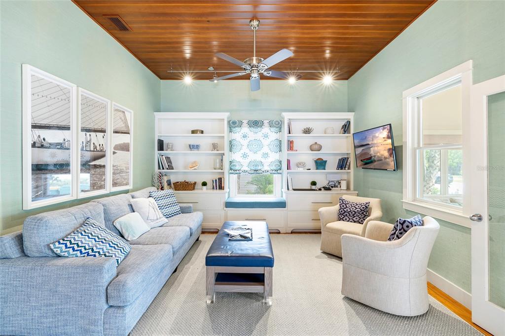 340 Palm Avenue Boca Grande, FL 33921 - Photo 8 of 38 a living room with furniture and a large window