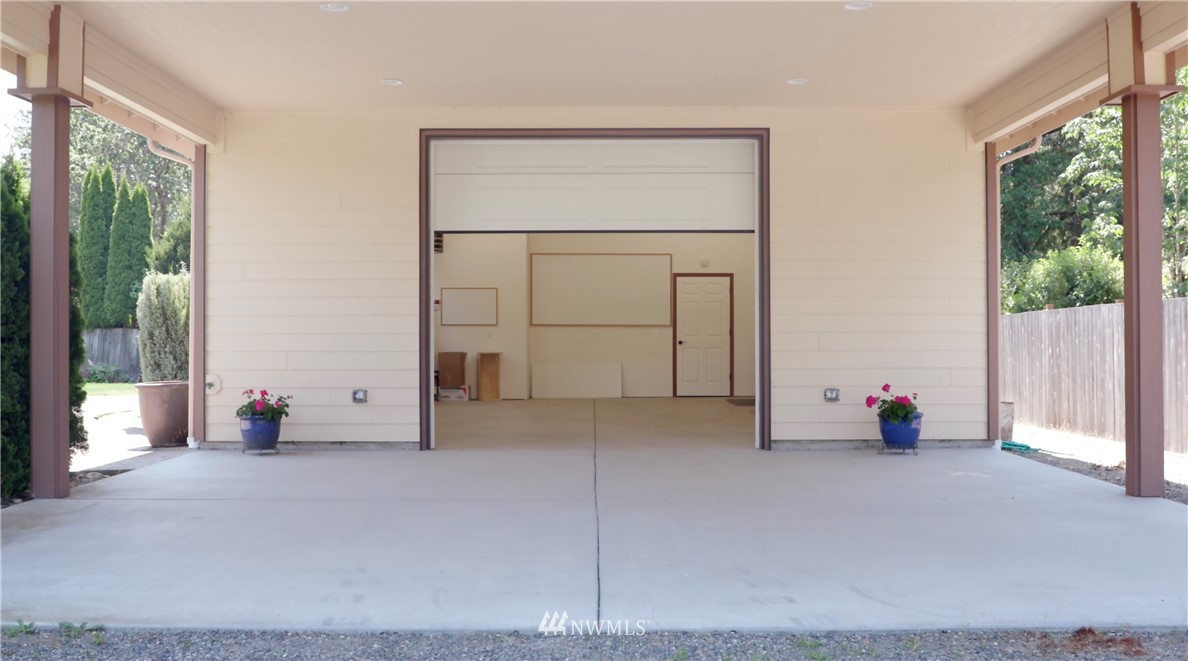9908 Meadow Road Southwest Lakewood, WA 98499 - Photo 25 of 25 a view of an empty room with wooden floor and a window