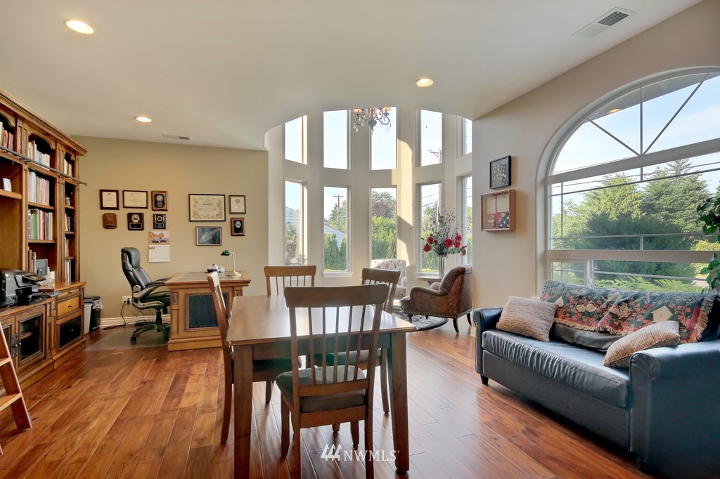 9908 Meadow Road Southwest Lakewood, WA 98499 - Photo 4 of 25 a living room with furniture and a large window