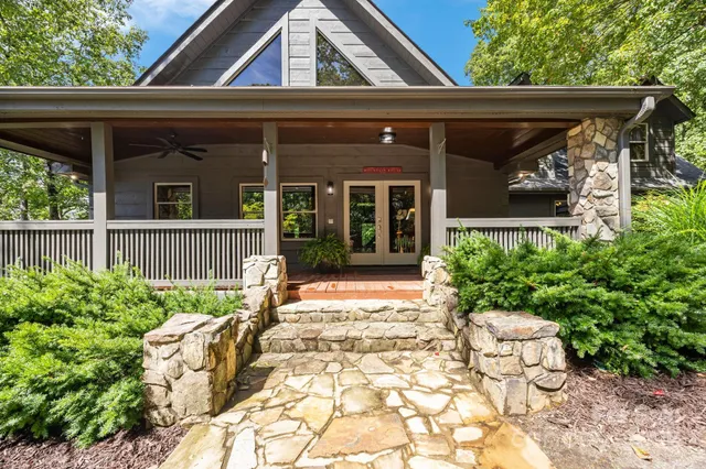 a view of a chair and table in the house front view