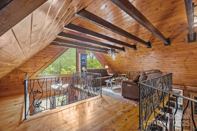 a view of a patio with table and chairs