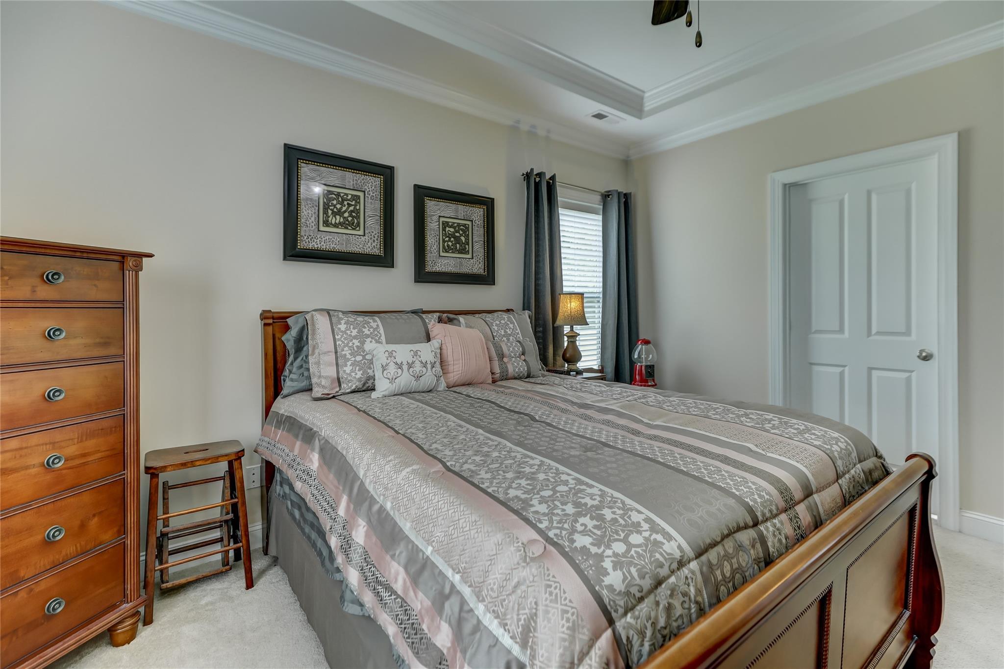 2005 Charles Avenue Lancaster, SC 29720 - Photo 18 of 42 a bedroom with a bed and a dresser