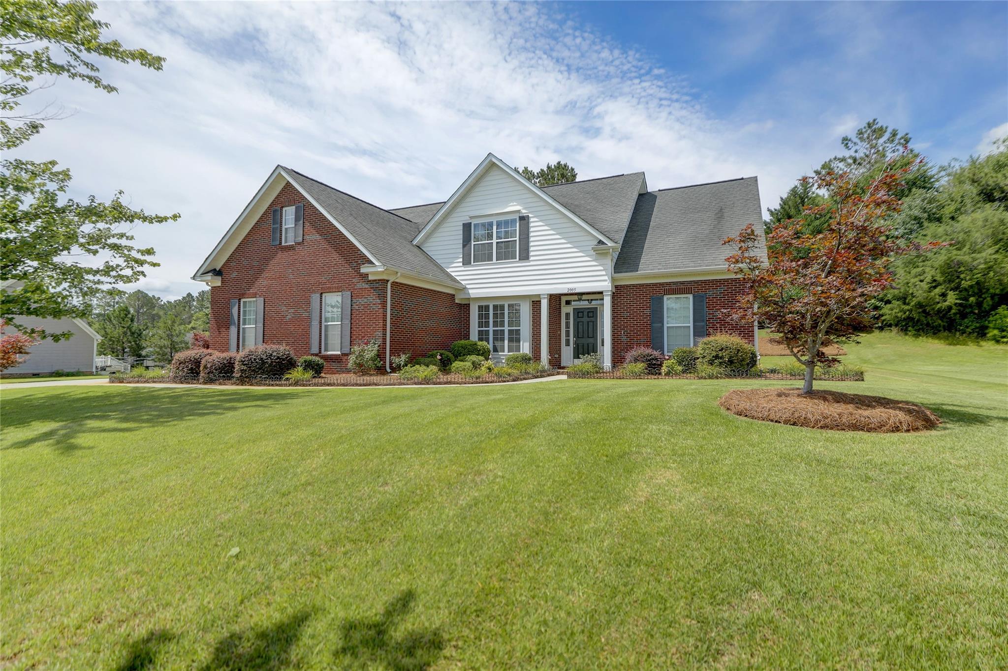 2005 Charles Avenue Lancaster, SC 29720 - Photo 2 of 42 a front view of house with yard and green space
