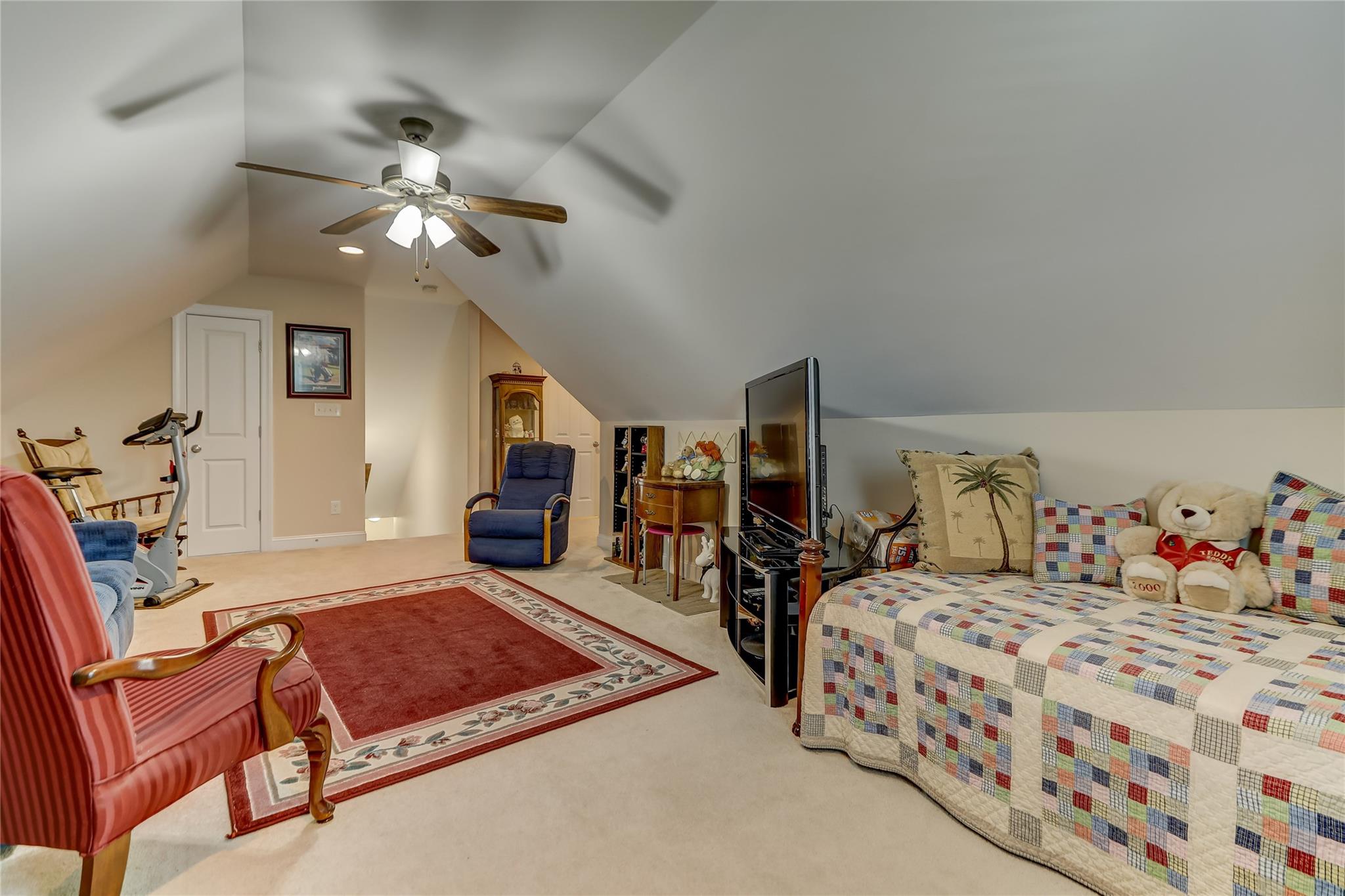 2005 Charles Avenue Lancaster, SC 29720 - Photo 28 of 42 a bedroom with a bed and a chandelier
