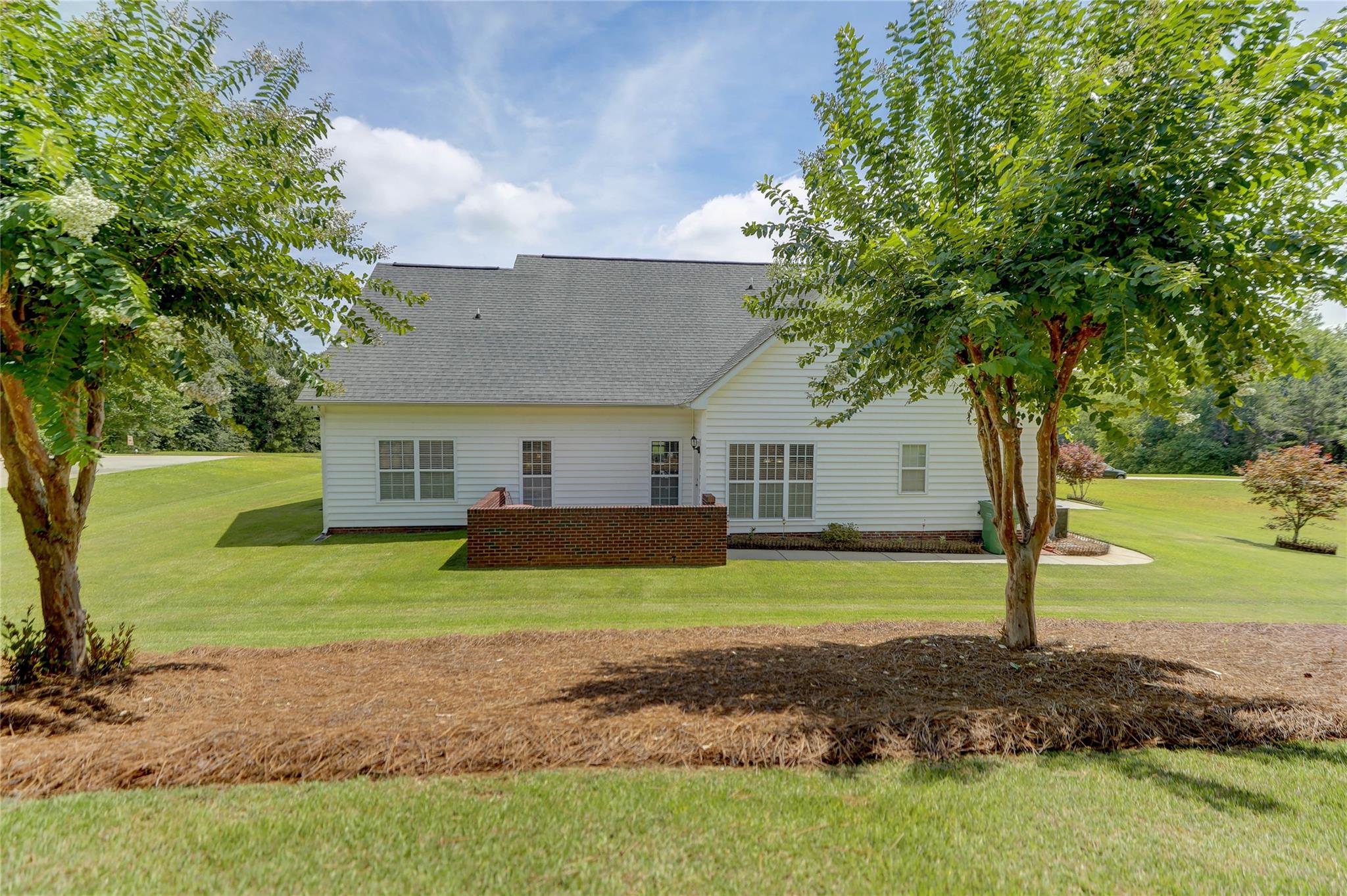2005 Charles Avenue Lancaster, SC 29720 - Photo 37 of 42 a front view of a house with a yard and trees