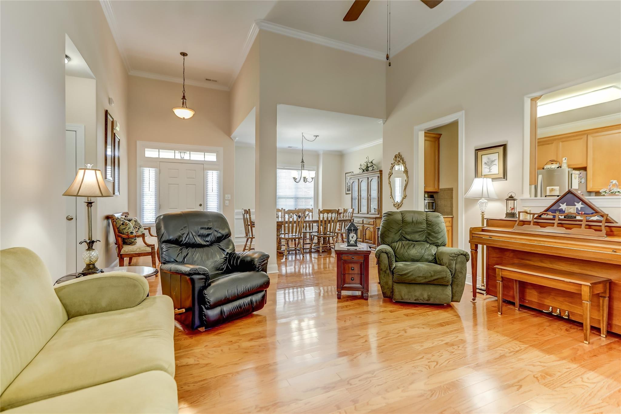 2005 Charles Avenue Lancaster, SC 29720 - Photo 8 of 42 a living room with furniture and a chandelier