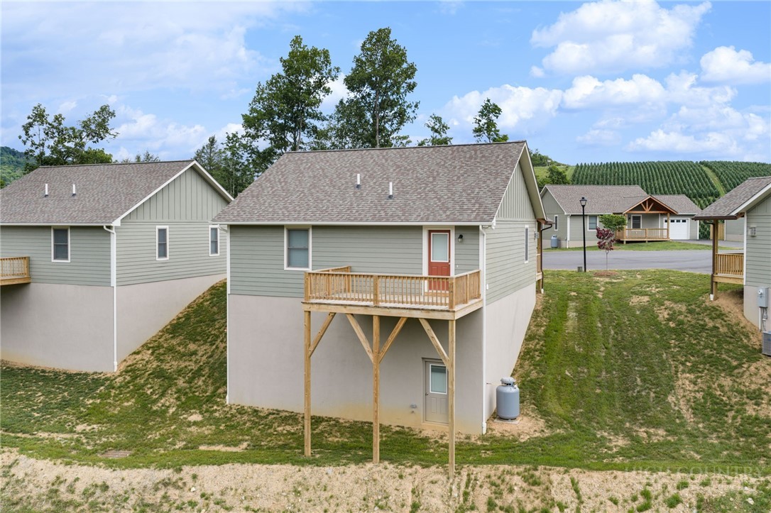 233 Ava Way, Unit 109 Boone, NC 28607 - Photo 8 of 27 a aerial view of a house with a yard